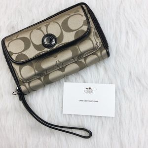 Coach brown logo zip around wristlet wallet
